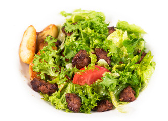 Wall Mural - salad with chicken liver on the white plate