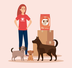 Canvas Print - girl volunteer with dogs and boxes with food