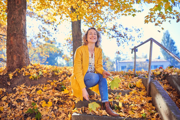 Lovely woman in autumn park