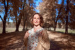 © badahos - Pretty woman portrait in autumn park