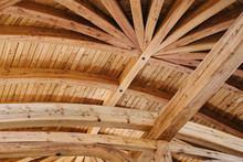 Part Of The Wooden Architecture Of The Building Interior. The Wood-paneled Ceiling With Wooden Beams Lining. Everywhere Is Present Texture Of Wood With Knots And Its Own Specific Structure.