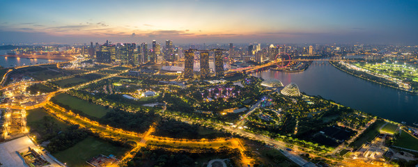 Fototapete - Panorama aerial view of the Singapore landmark financial business district at twilight sunset scene with skyscraper and beautiful sky. Singapore downtown