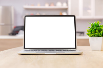laptop showing blank screen on work table front view in home- image