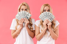 Mystery Blonde Twins Wearing In T-shirts Hiding Behind A Money