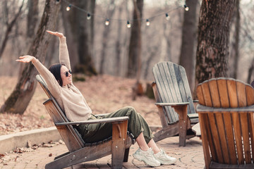 Woman relaxing in the forest on weekeend