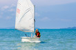 © famveldman - Child sailing. Kid learning to sail on sea yacht.