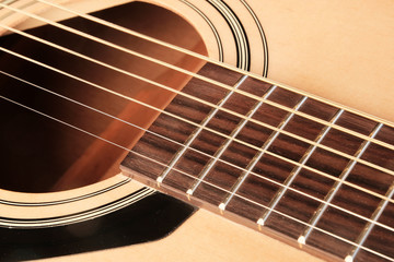 Acoustic guitar. Separate fragment. Musical instrument.