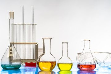 Poster - Glass flasks for reagents. Chemical tubes. Medical glass containers. Chemical laboratory. Laboratory research. Chemical analysis. Biochemistry. Pharmacology.