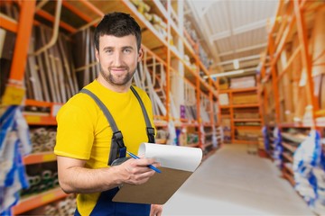 Wall Mural - Portrait of happy young foreman with hard hat