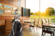 Golf Bag  And Golf Clubs  Of Golfer Have Breakfast In Club House Restaurants At Golf Course. Before Playing The Game In The Morning.