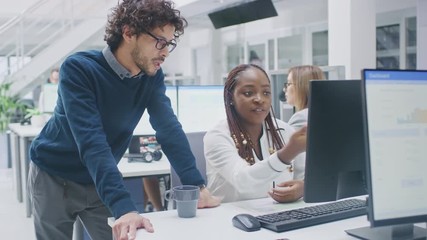 Aufkleber - In the Busy Corporate Office: Manager Talks to Businesswoman who Works on Desktop Computer. Businesspeople an Working with Clients, Having Discussions and Analysing Statistics