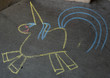 © kellyvandellen - Chalk Outline of Unicorn on Sidewalk