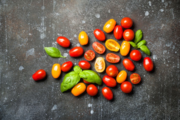 Wall Mural - Red and yellow fresh cherry tomatoes on vintage table