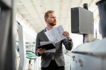 Factory supervisor on duty. Inspector comes to a factory Manager at a factory. Boss checking the warehouse during the day