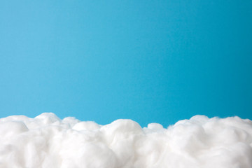 cloud made out of cotton wool on sky blue background