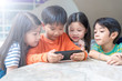 © Songkhla Studio - KID PLAY MOBILE TOGETHER