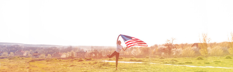 happy women running in the field with american flag usa celebrate 4th of july
