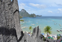 Boats Sail With Tourists On Board For Their Island Hopping In El Nido, Palawan In The Philippines. View Seen From Taraw Cliff.