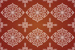 Luxury seamless pattern hand drawn traditional ornament decoration mixed with victorian style. Geometry each side for fashion fabric, knit, textile, batik. Brown background.