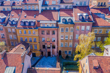 Old town square with historic street town architecture and windows multicolored pattern of pink and yellow vintage color buildings