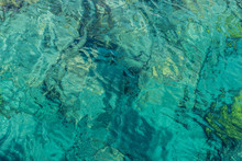 Aquamarine Transparent Tropic Sea Water Abstract Surface With Small Waves Natural Blurred Seamless Background