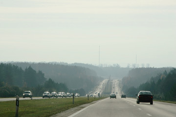 Highway in Lithuania at spring time smog