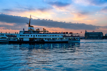 Wall Mural - Istanbul, Turkey, 11 June 2007: Sunset of Kadikoy, City Lines, Haydarpasa Railway Station