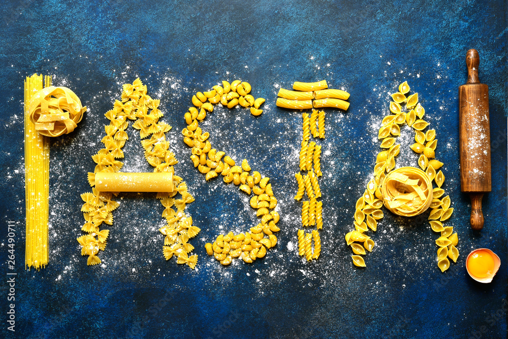 Culinary background with inscription made from different types of pasta ...