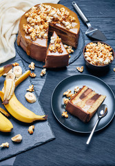 Wall Mural - sliced banana sponge cake, vertical top view