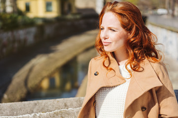 Wall Mural - Thoughtful introspective young redhead woman