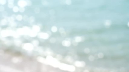 Wall Mural - blurred sea wave and summer day background blur with bokeh sparkle light blink