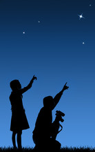 Father And His Daughter Study The Starry Sky