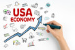 © STOATPHOTO - USA Economy Concept. Hand with marker writing