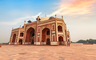 Fototapete - Humayun Tomb Delhi red sandstone architecture primary structure at sunset with moody sky