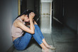 © TeTe Song - depression young girl teenager having abused problem feeling suffering sitting alone in the dark room, Domestic violence, family problems, Stress, violence, The concept of depression and suicide..