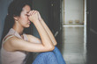 © TeTe Song - depression young girl teenager having abused problem feeling suffering sitting alone in the dark room, Domestic violence, family problems, Stress, violence, The concept of depression and suicide..