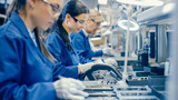 Women working in electronics factory