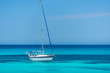 Anchored sailing yacht on the turquoise sea