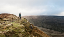 UK, Wales, Brecon Beacons, Craig Y Fan Ddu, Woman Hiking In Rolling Landscape