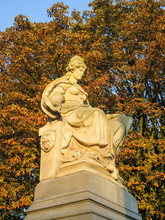 City Center Park Vondelpark In Amsterdam, Netherlands. Statue At The Entrance.