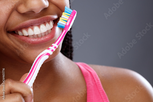 Fotografía Oral hygiene with toothbrush in girl’s hand, close up