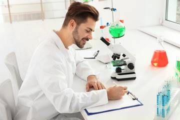 Poster - Medical student working in modern scientific laboratory