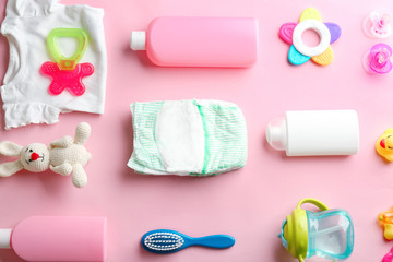 Wall Mural - flat lay composition with baby accessories on color background