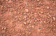 Red Brown Gravel Or Soil Texture Background For Design Close Up