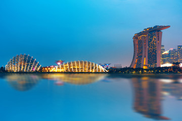 Wall Mural - Singapore Skyline. Singapore`s business district, blue sky and night view for marina bay . singapore city is most popular travel city in southeast asia.