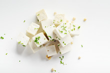 Soy Bean Curd Tofu With Greens On White Background Non-dairy Alternative Substitute For Cheese