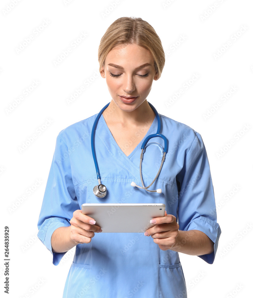 Female medical assistant with tablet computer on white background