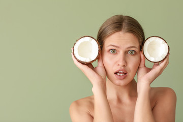 Sticker - Funny young woman with coconut on color background