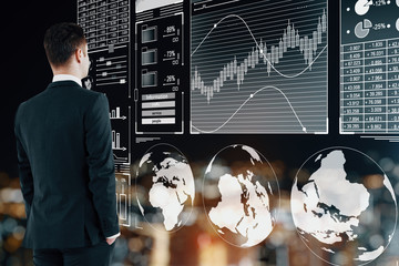 Poster - Attractive european businessman with business interface