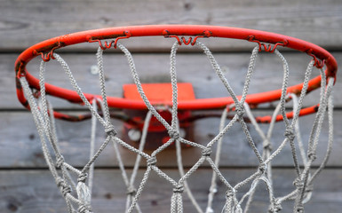 Wall Mural - closeup of an old basketball hoop outdoors